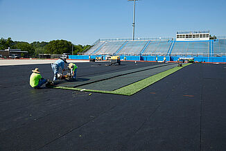 Spring Grove Area High School - Installation Process A thorough look into the installation process of synethetic turf at Spring Grove Area High Schoolon REGUPOL abzorb synthetic turf shock pad. The installation process ensures a high-quality surface for athletes.