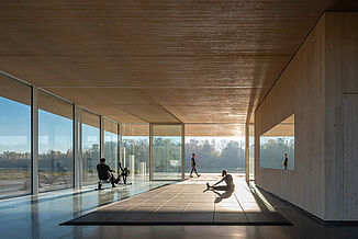 Neil Campbell Rowing Centre - Inside View of Facility Inside view of the Neil Campbell Rowing Centre. The facility features REGUPOL aktivpro rubber tiles within the facility, with a view of the water through the glass walls.
