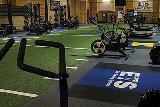 Elite Training Systems - Customizability with REGUPOL crash Platforms The Elite Training Facility in the Honourable W.C. Kennedy Collegiate building provides a variety of equipment for athletes. Each REGUPOL crash lifting platform is customized with logos and seamlessly transitions with REGUPOL aktivpro roll flooring.