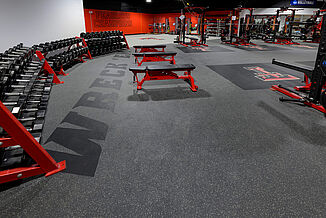 Texas Tech Volleyball - Inlaid Messaging Inlaid messaging in the free weight area of the Texas Tech Volleyball weight room.
