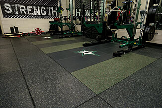 Dallas Stars Weight Training - Facility View Dallas Stars weight training facility features a variety of equipment and weights for their athletes to utilize. REGUPOL aktivpro tiles are used throughout the facility.