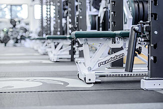 Michigan State Football Weight Room - REGUPOL crash zone View of REGUPOL crash zones located within the Michigan State football weight lifting facility.