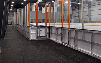Thayer Sports Ice Rink View of Thayer Sports Center's indoor ice hockey rink featuring REGUPOL sports flooring.
