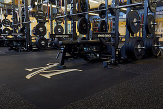 Millersville University Performance Center - Platforms Millersville University performance center weight racks utilize REGUPOL crash platforms that are seamlessly inlaid into the floor to provide a safe, flat surface for athletes.