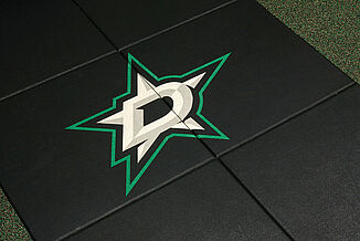 Dallas Stars Weight Training - Logo Design REGUPOL aktivpro tiles were used throughout the Dallas Stars weight training facility. The Dallas Stars logo is inlaid into the tiles.