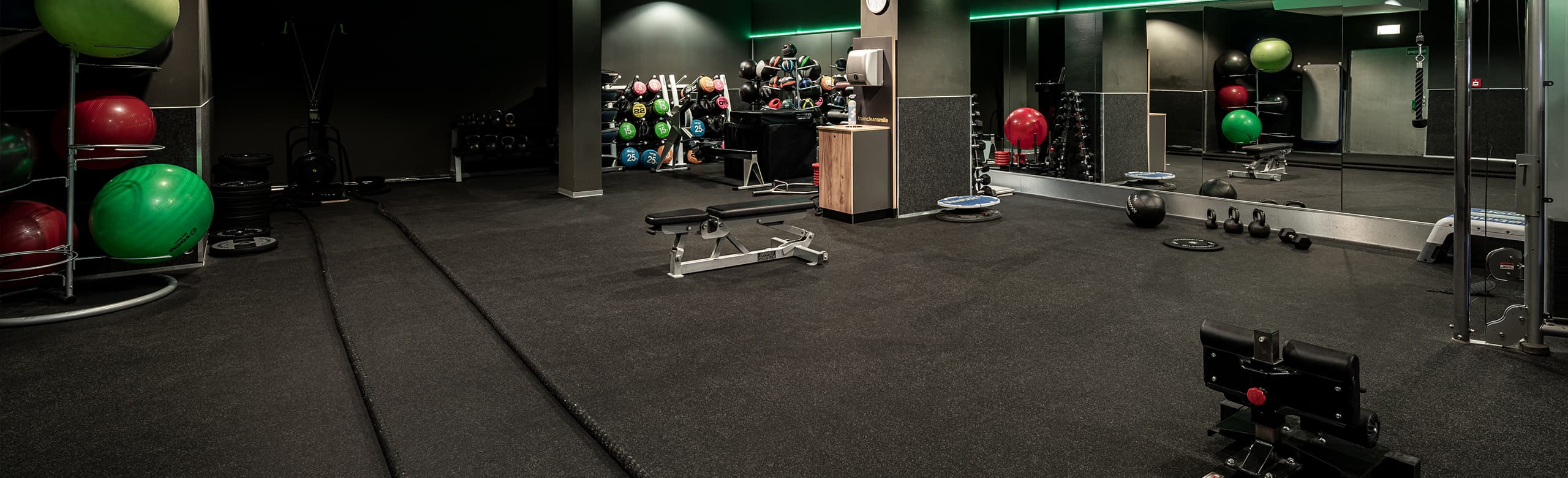 REGUPOL fitness flooring in a gym with free weights area