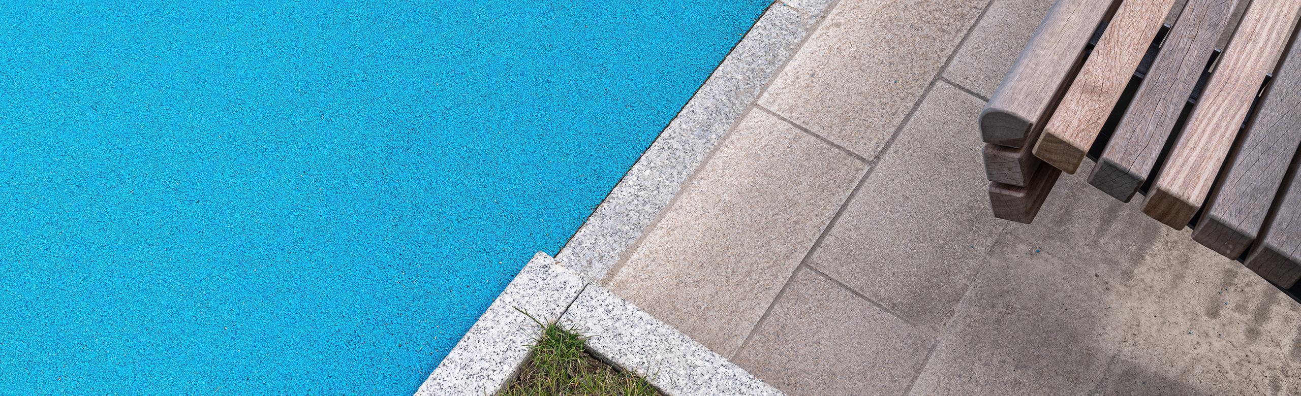 Colourful walkways and squares with REGUPOL synthetic flooring. Walkway made of colourful synthetic flooring from REGUPOL