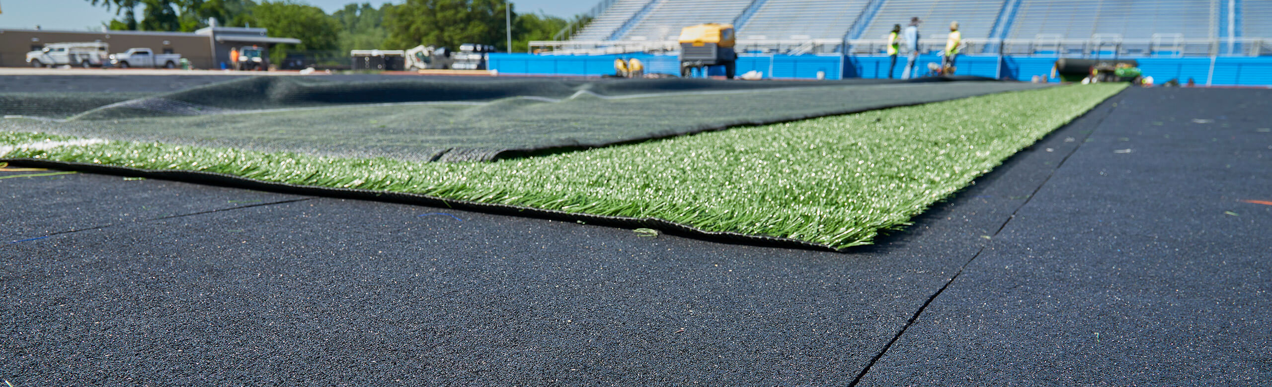 Spring Grove Area High School - Stadium View with REGUPOL abzorb Enhanced view of the Spring Grove Area High School's new construction turf area, featuring REGUPOL abzorb beneath the turf.