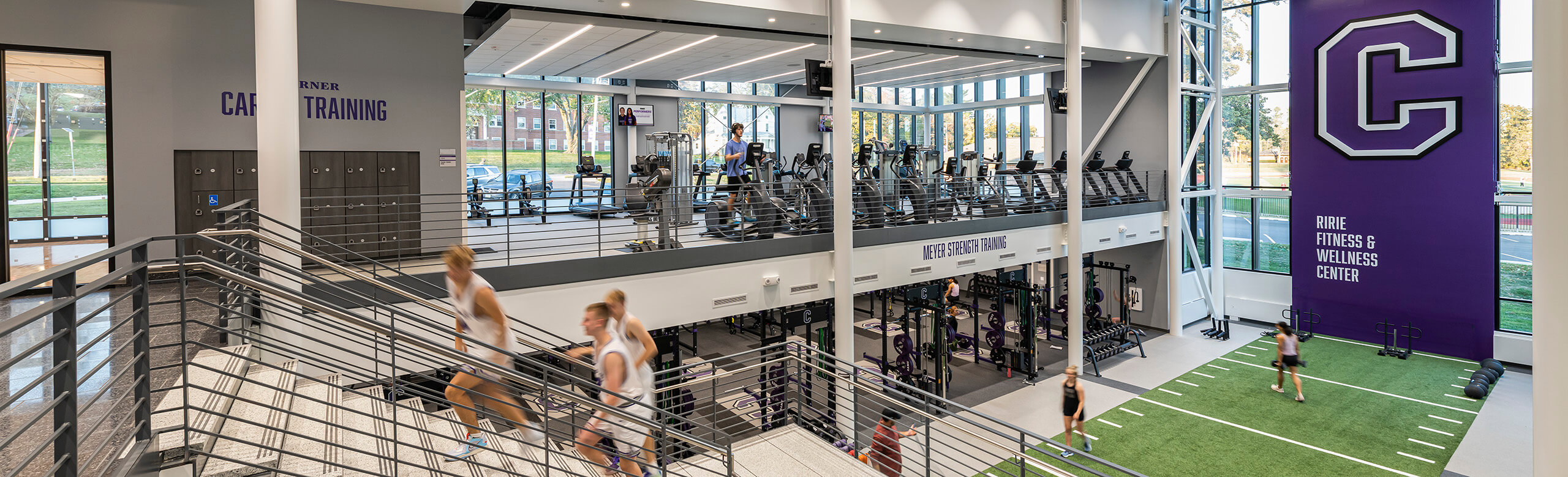 Cornell College - View of Facility Cornell College's Athletic and Wellness center that features REGUPOL flooring throughout the facility. A view of the cardio area upstairs and the weight training facility on the lower level.